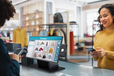 POS terminal in a fashion retail store checkout environment